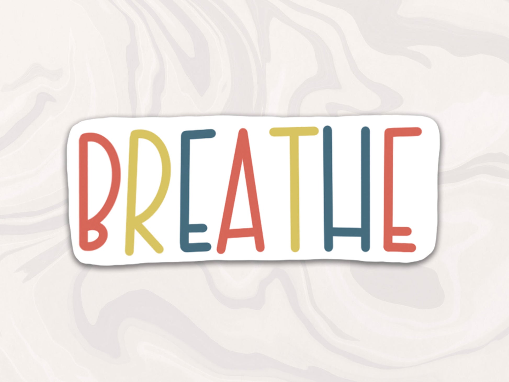 colorful sticker that reads breathe